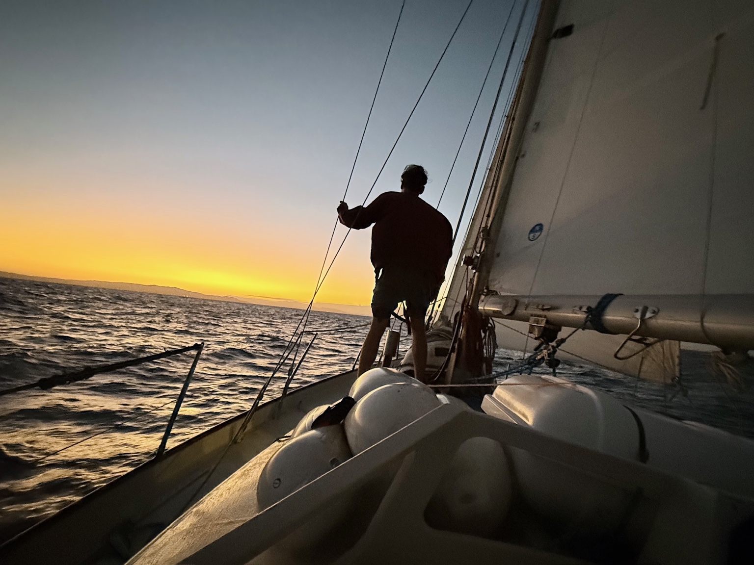 Sunset silhouette on deck